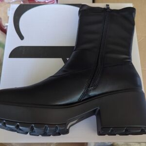 Sleek Black Heeled Boots